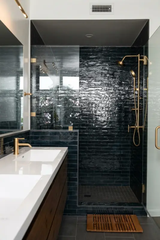 Detailed tile and finish work in a remodeled bathroom